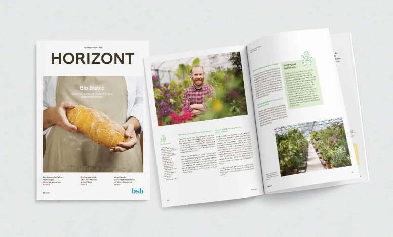Horizont 2022 Zwei Ausgaben des Horizont Magazin von 2022. Die eine zeigt das Titelbild, die andere eine offene Doppelseite.
