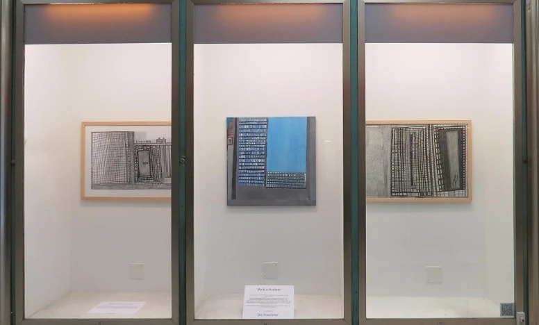 Vitrine Markus Buchser März 2023 Vitrine mit Bildern in der Rümelins-Passage